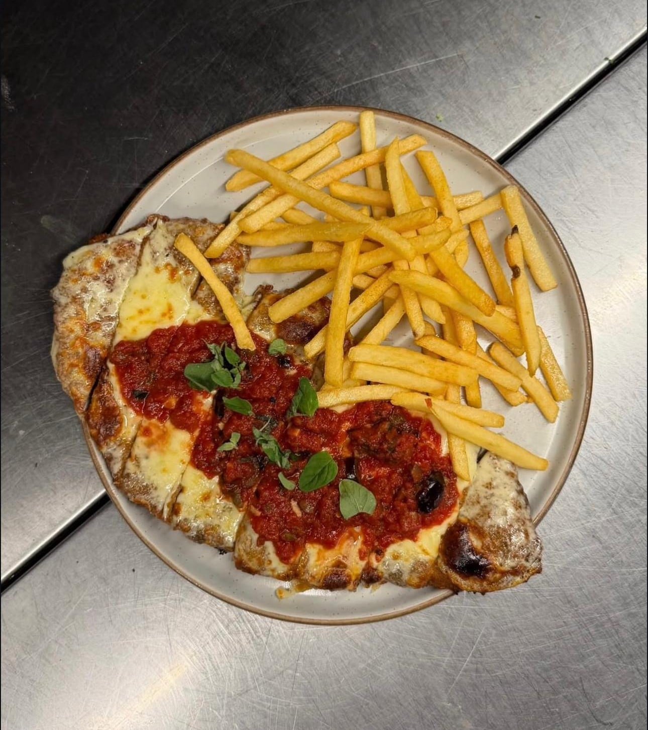 Milanesa napolitana con papas